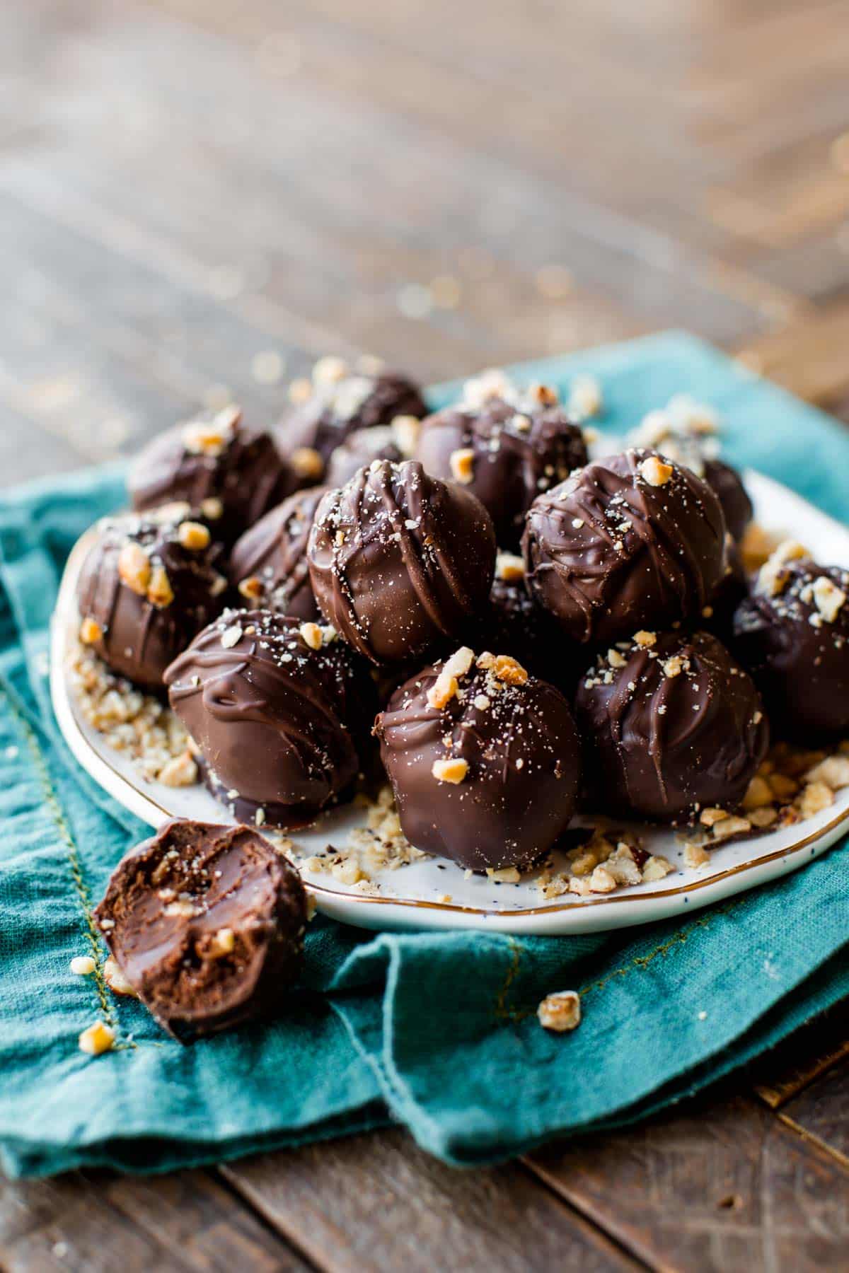 chocolate hazelnut crunch truffles on a white plate