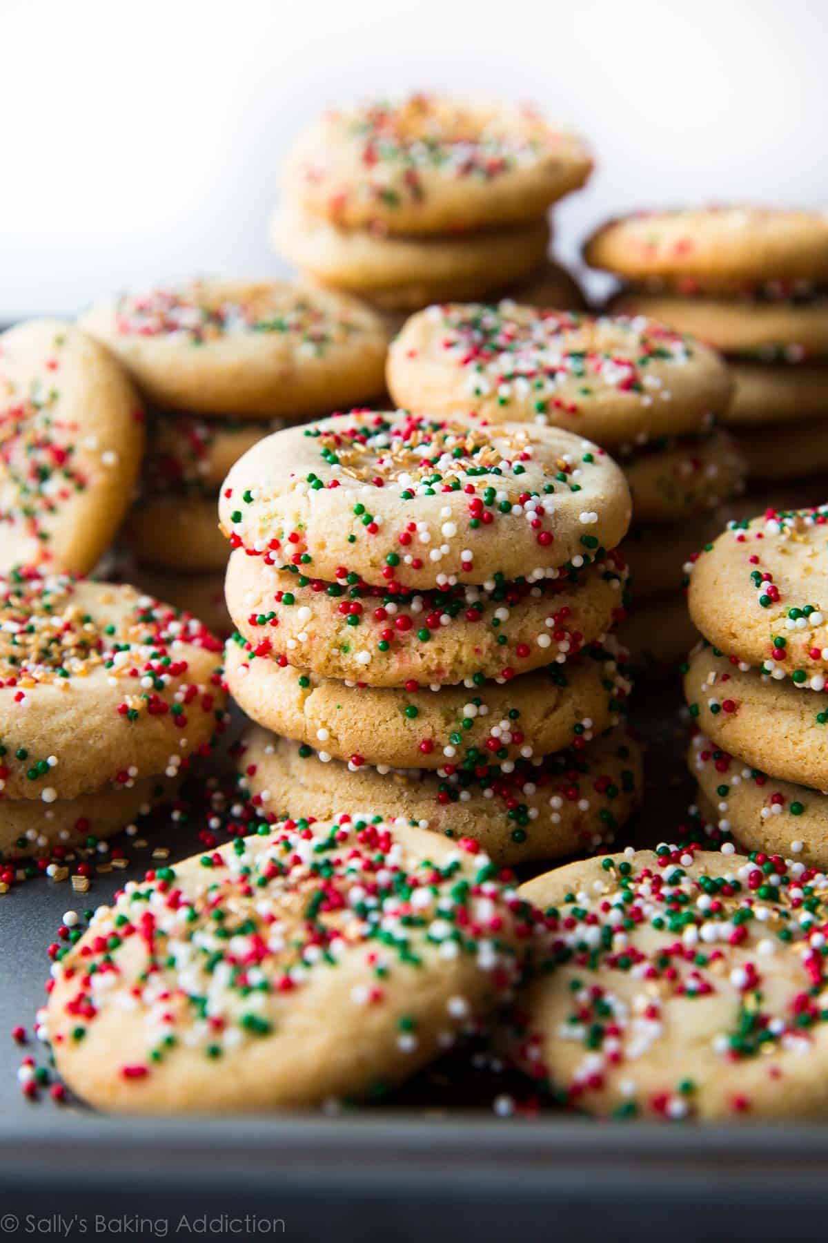 stacks of brown butter sugar cookies with Christmas sprinkles