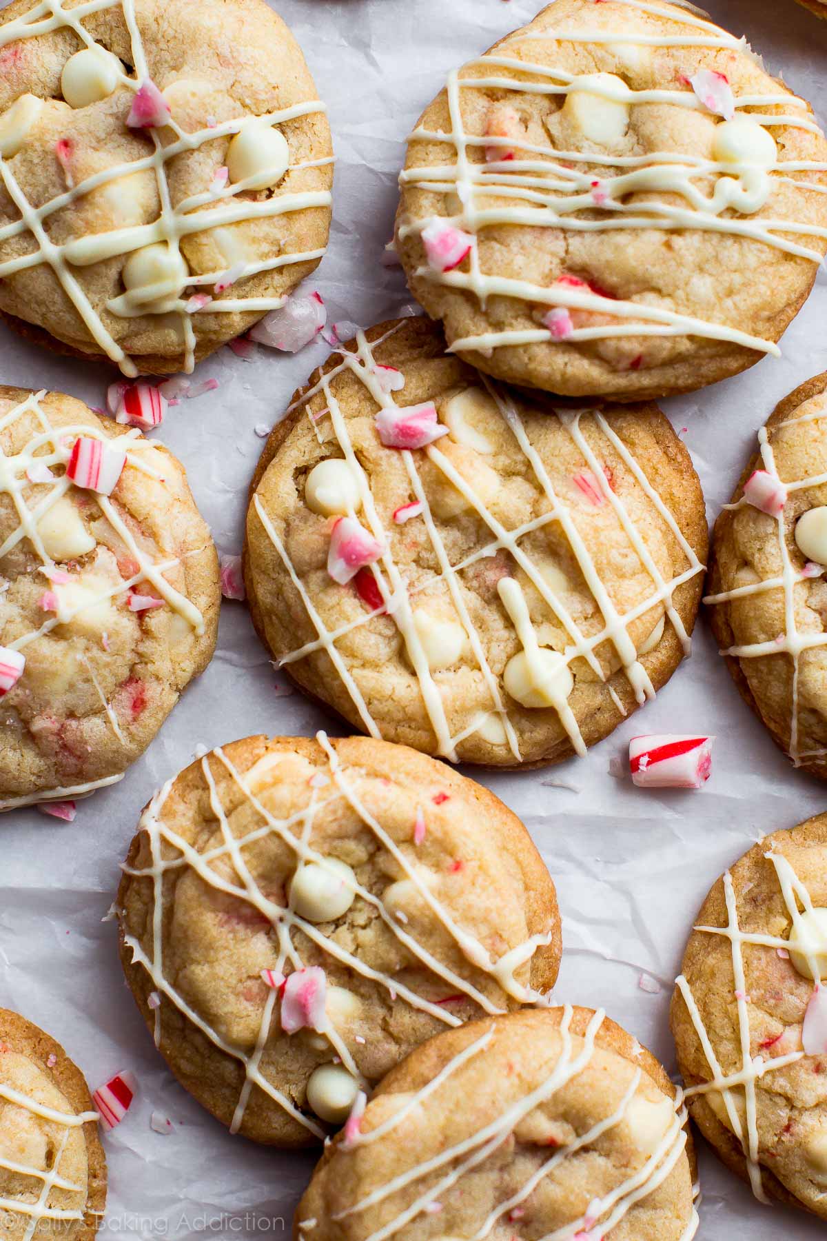 overhead image of peppermint white chocolate cookies drizzled with white chocolate