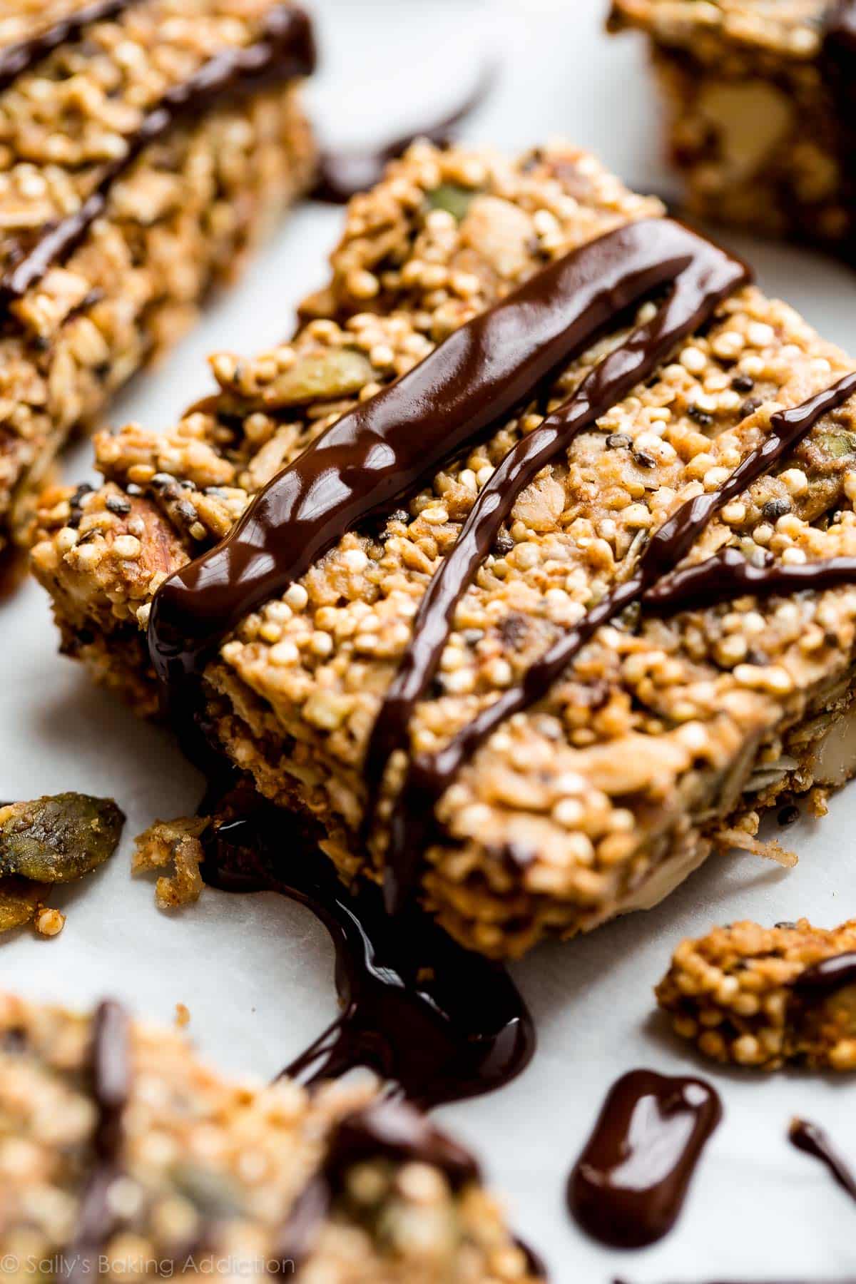 quinoa crunch snack bar drizzled with melted chocolate