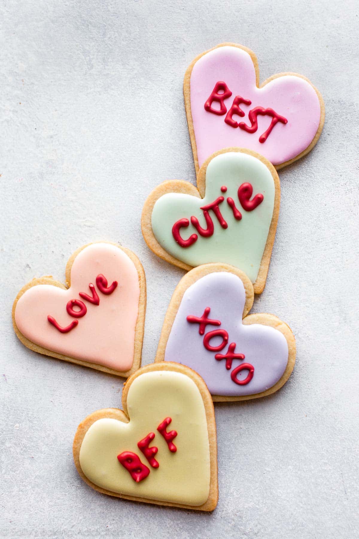 conversation heart sugar cookies with colorful royal icing