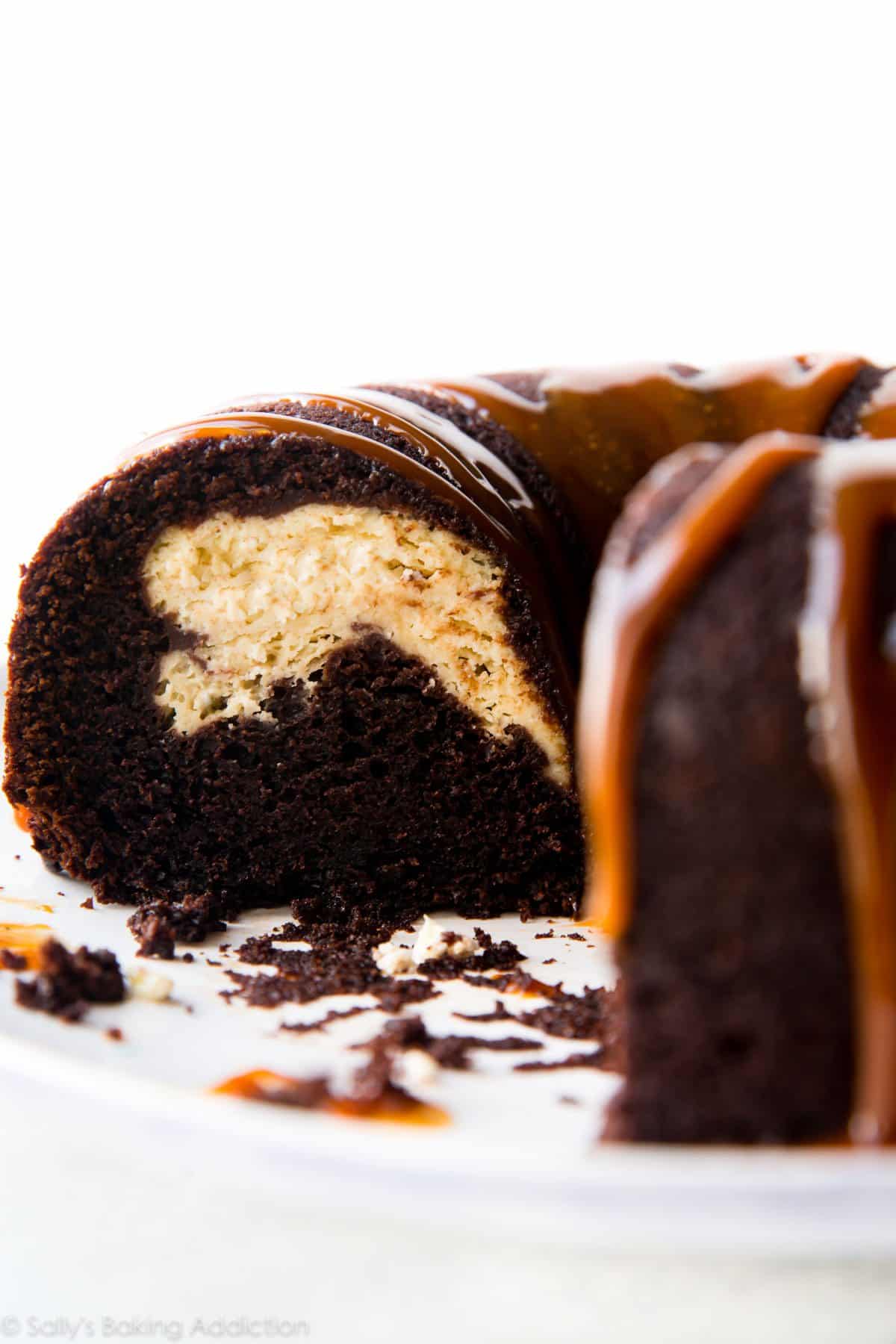 side view of chocolate cream cheese bundt cake showing the cream cheese filling