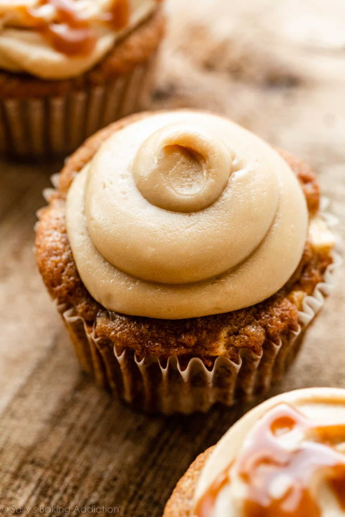 cupcake with piped salted caramel frosting on top.