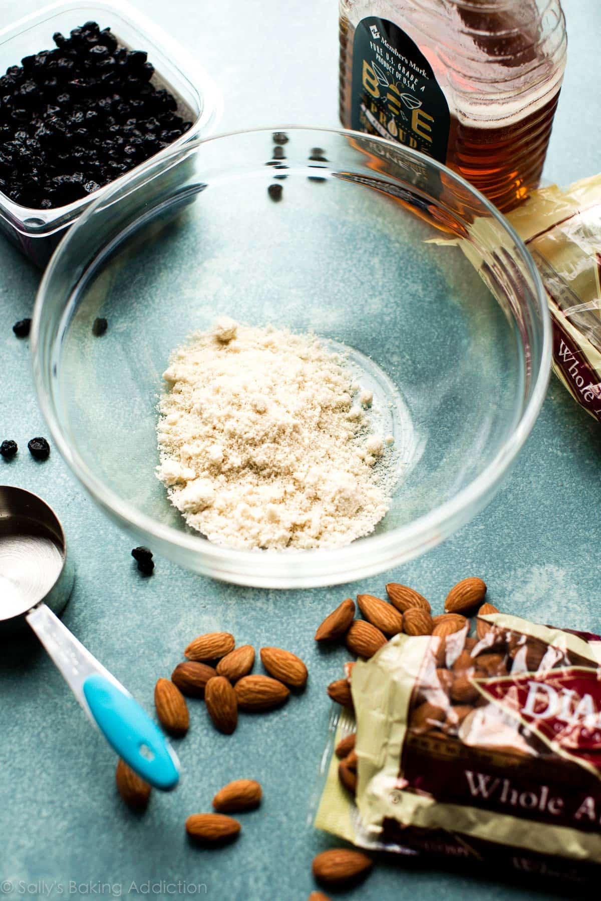 blueberry almond snack bar ingredients with a glass bowl
