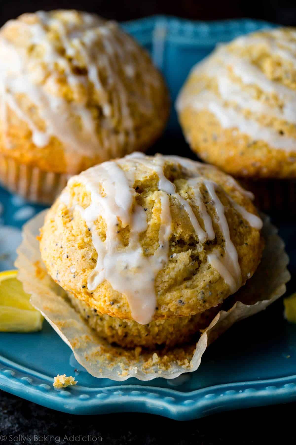 lemon poppy seed muffins on a blue plate