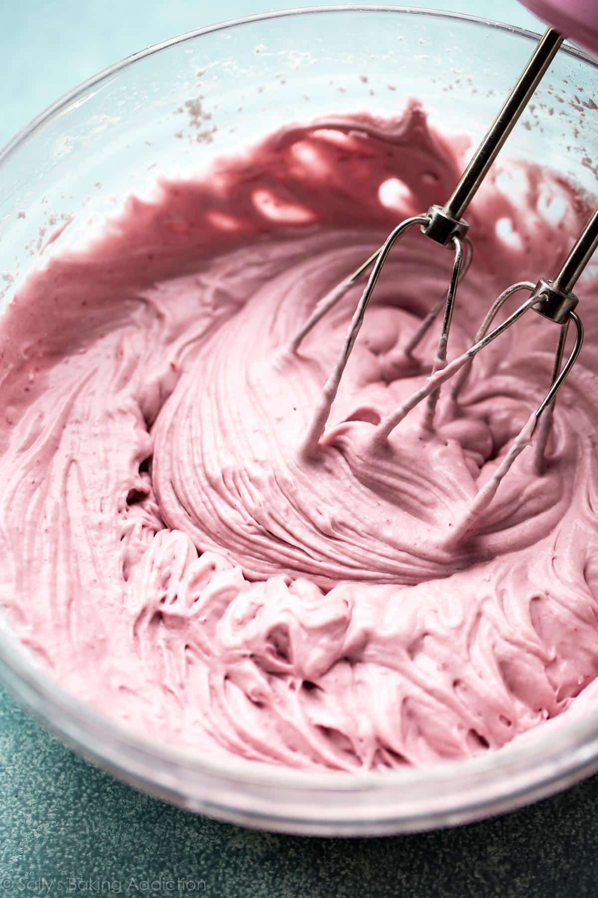 blackberry cream cheese frosting in a glass bowl