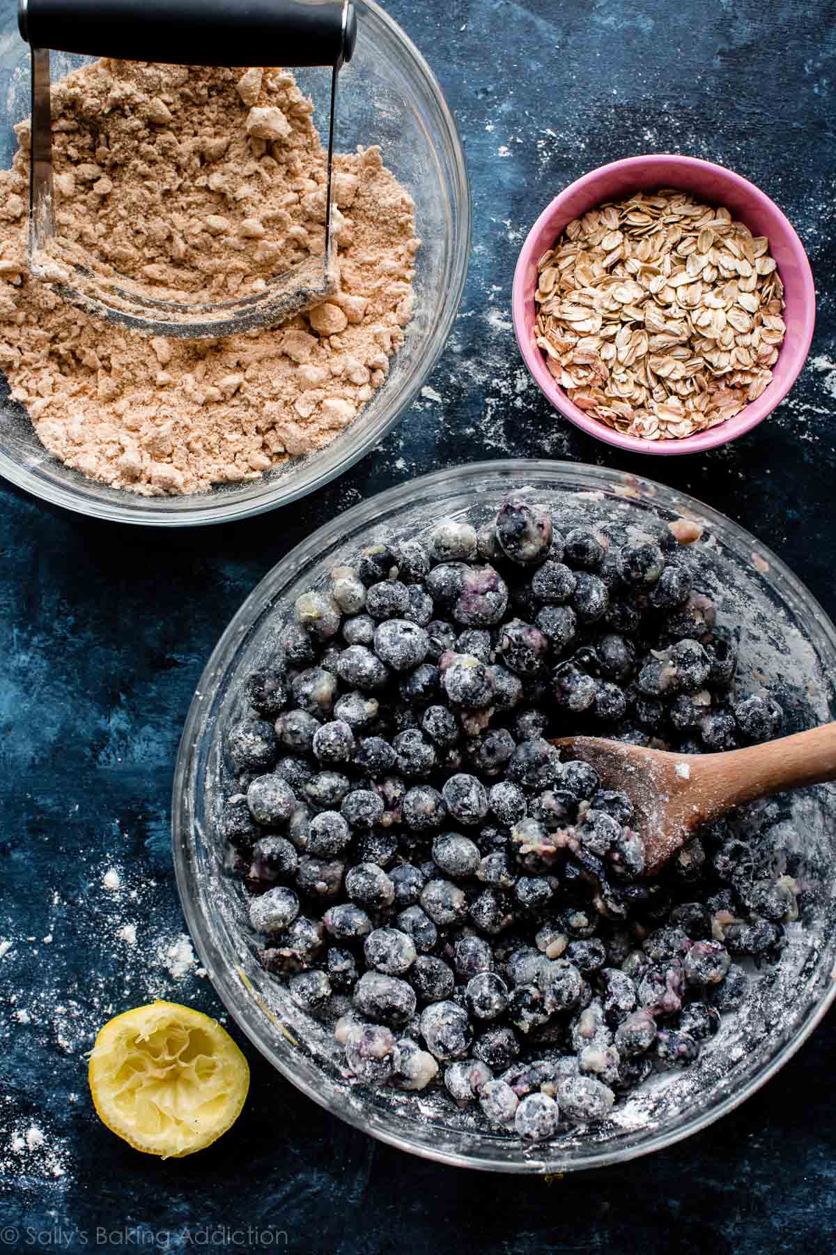 blueberry pie filling and crumble topping in glass bowls