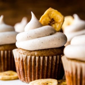 banana cupcakes topped with cinnamon cream cheese frosting