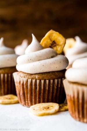 banana cupcakes topped with cinnamon cream cheese frosting