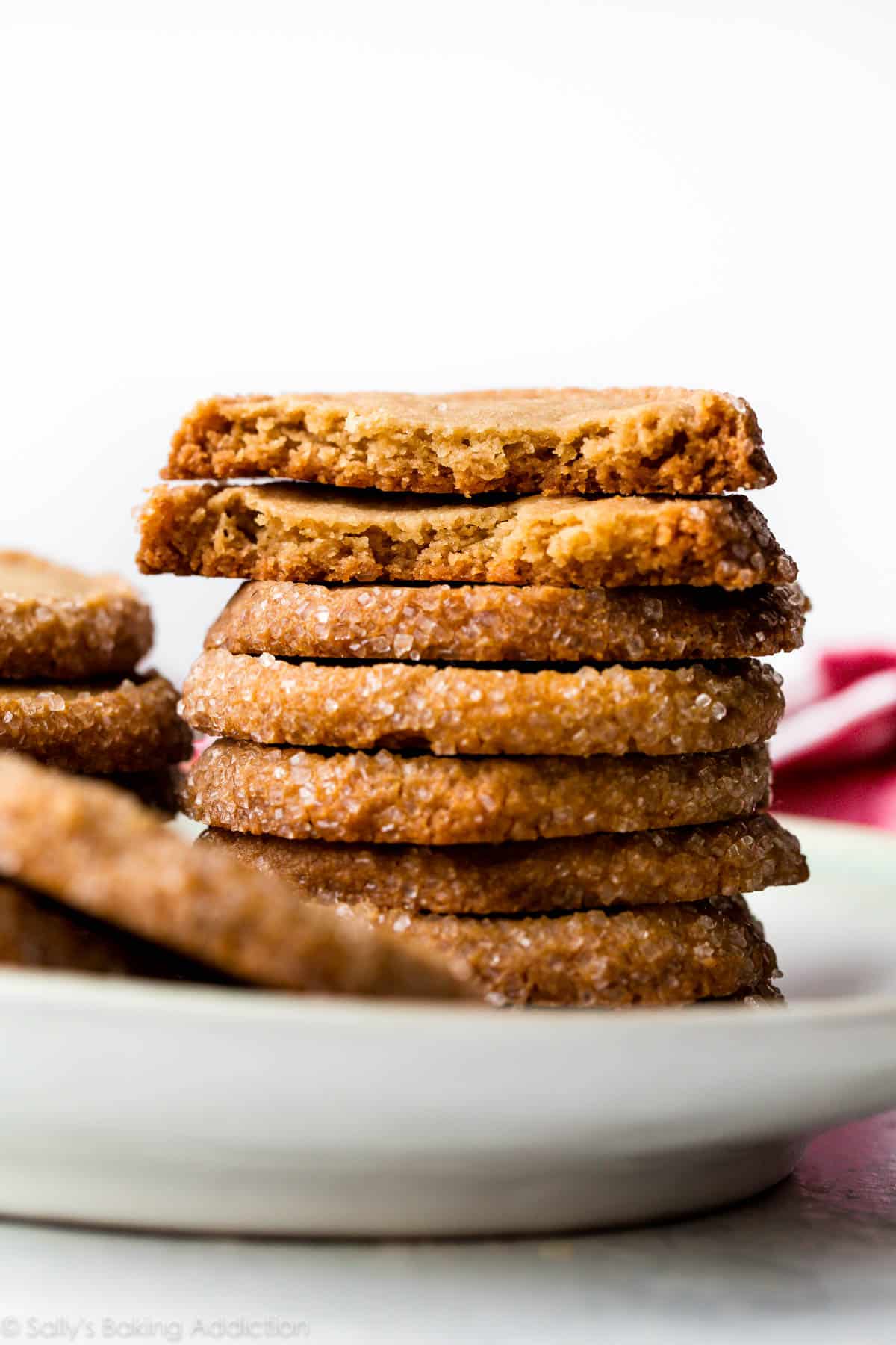 stack of brown sugar shortbread cookies on a white plate