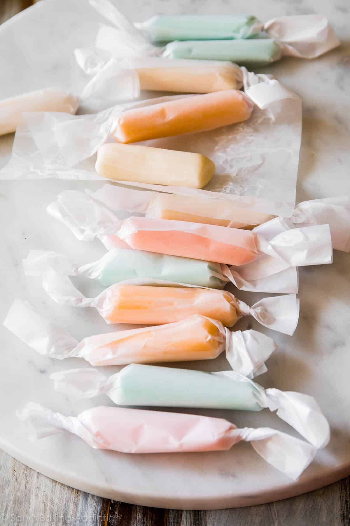 pieces of salt water taffy wrapped in parchment