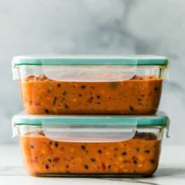 chicken chili in glass container for freezer meal