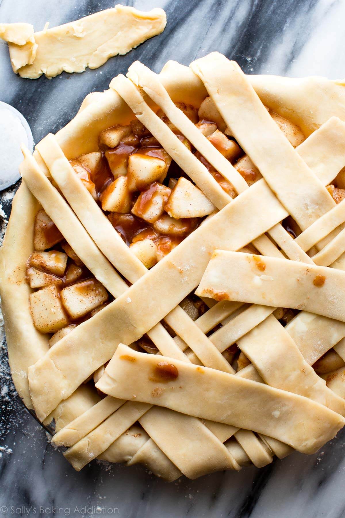 lattice pie dough topping on caramel pear pie