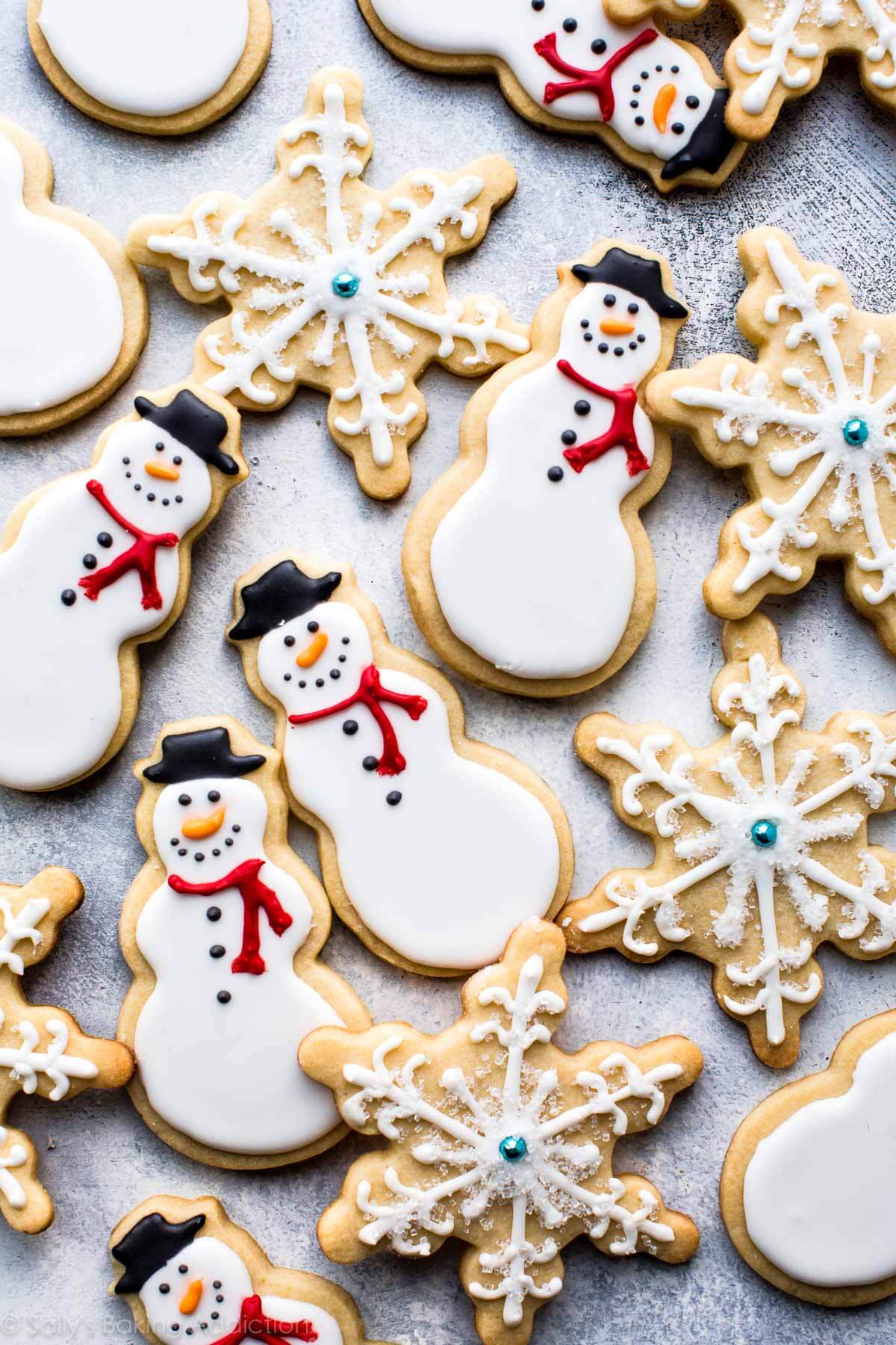 decorated snowman and snowflake sugar cookies