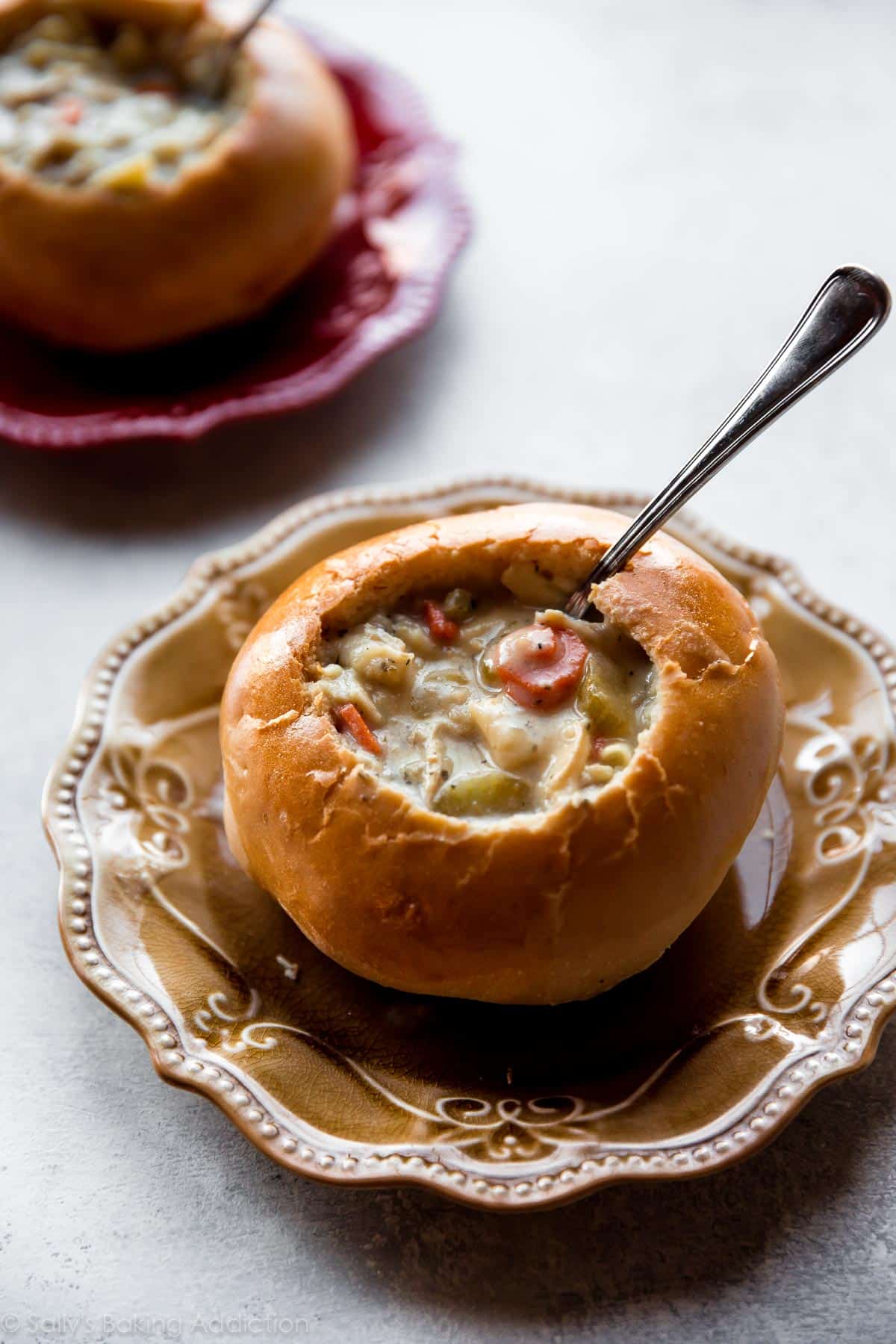 2 bread bowls with soup inside