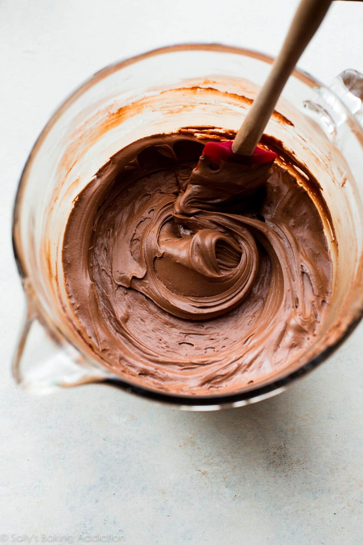 chocolate cream cheese frosting in a glass bowl