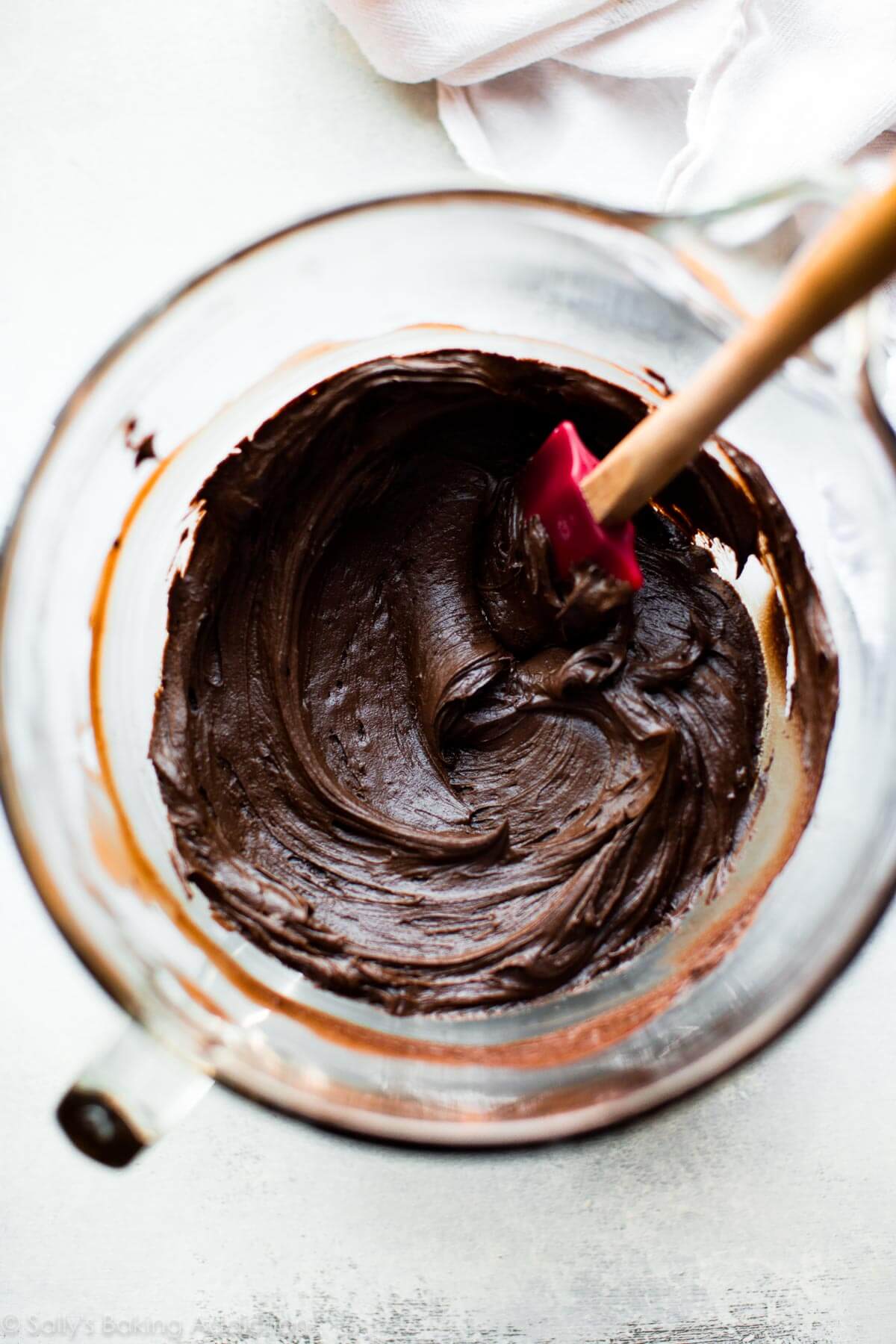 chocolate silk frosting in a glass bowl