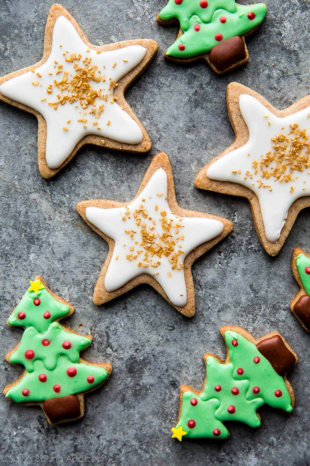 star and Christmas tree decorated sugar cookies