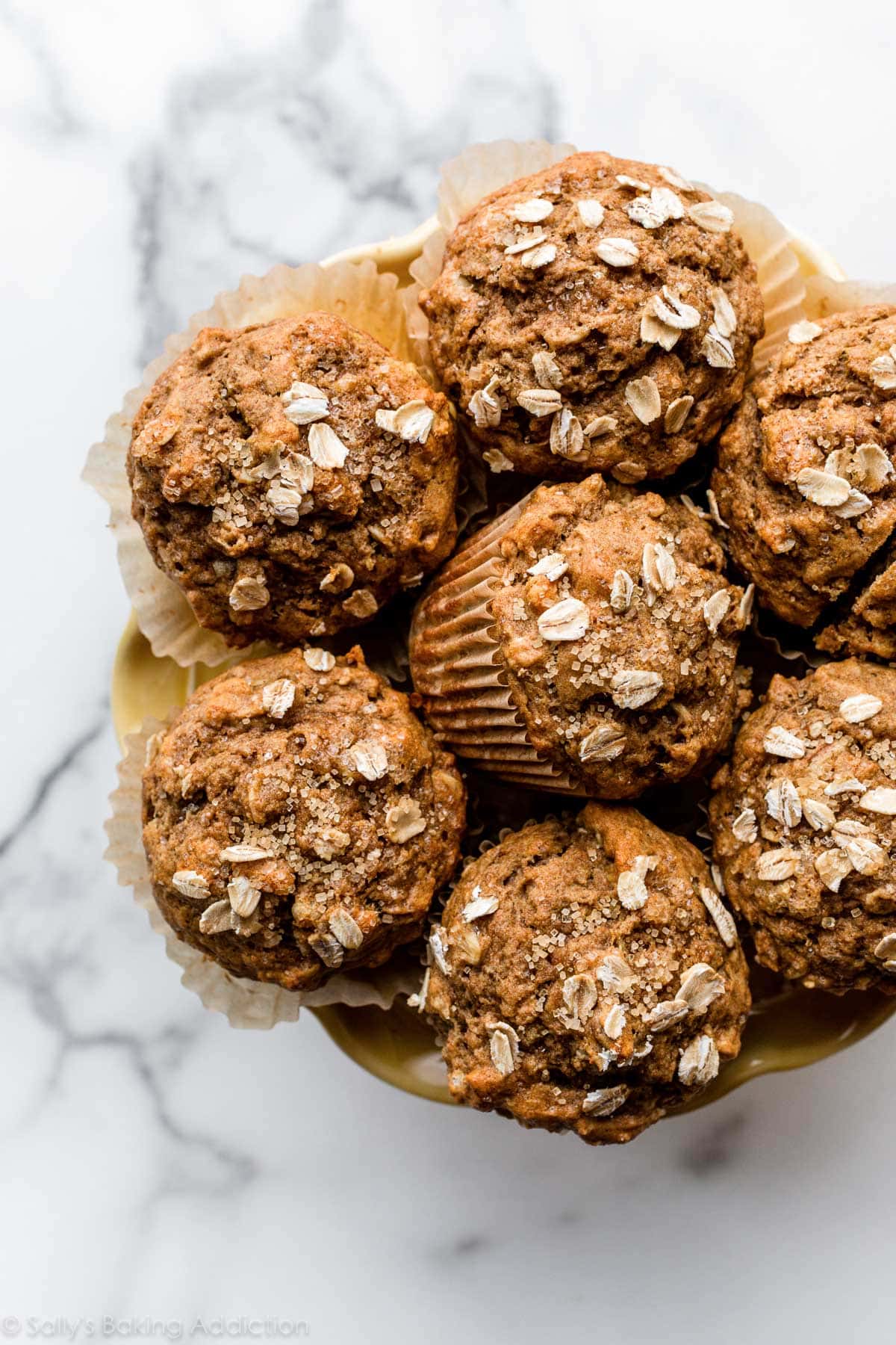 healthy whole wheat banana muffins with oats on top