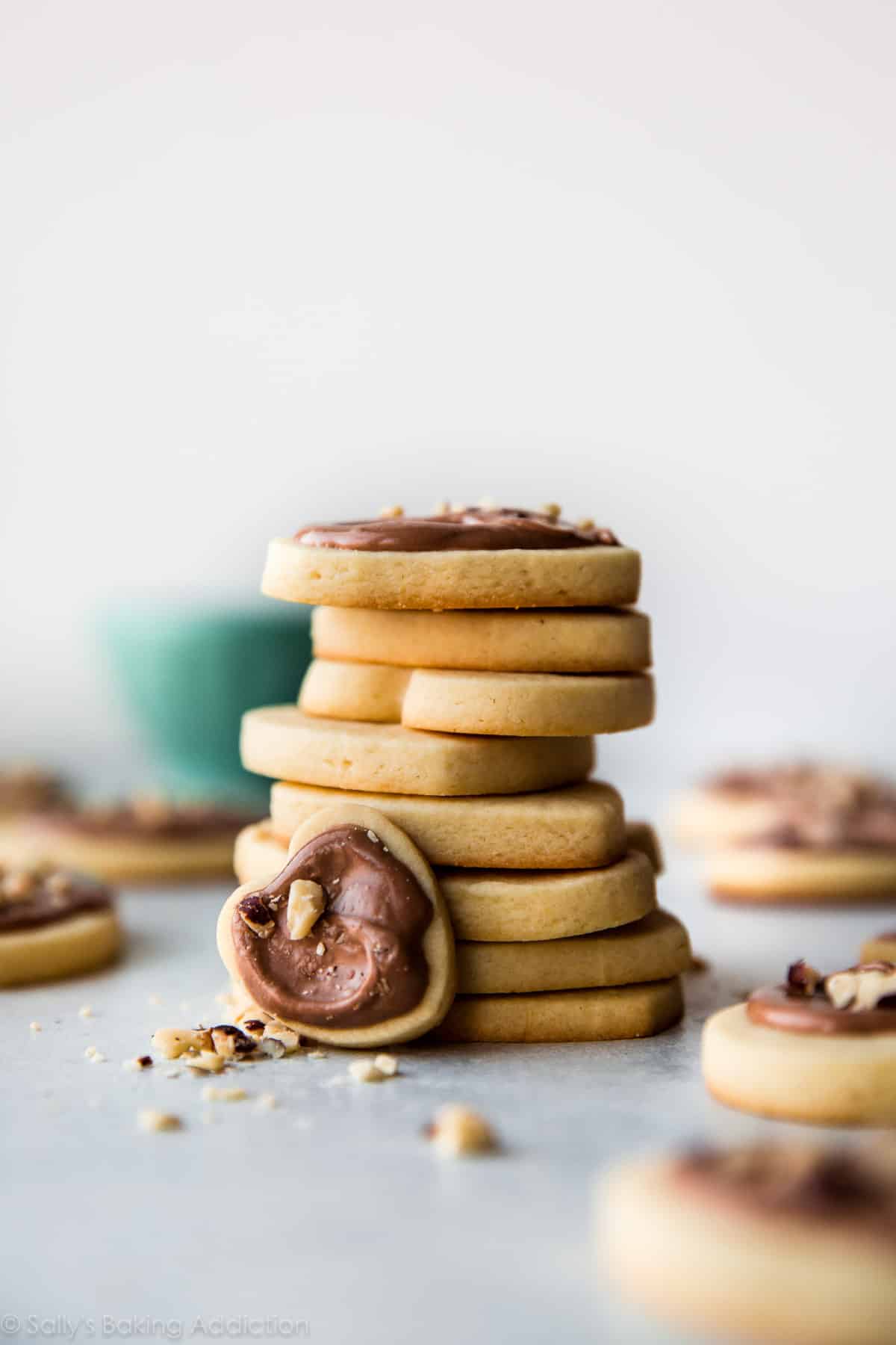 stack of heart sugar cookies with Nutella glaze