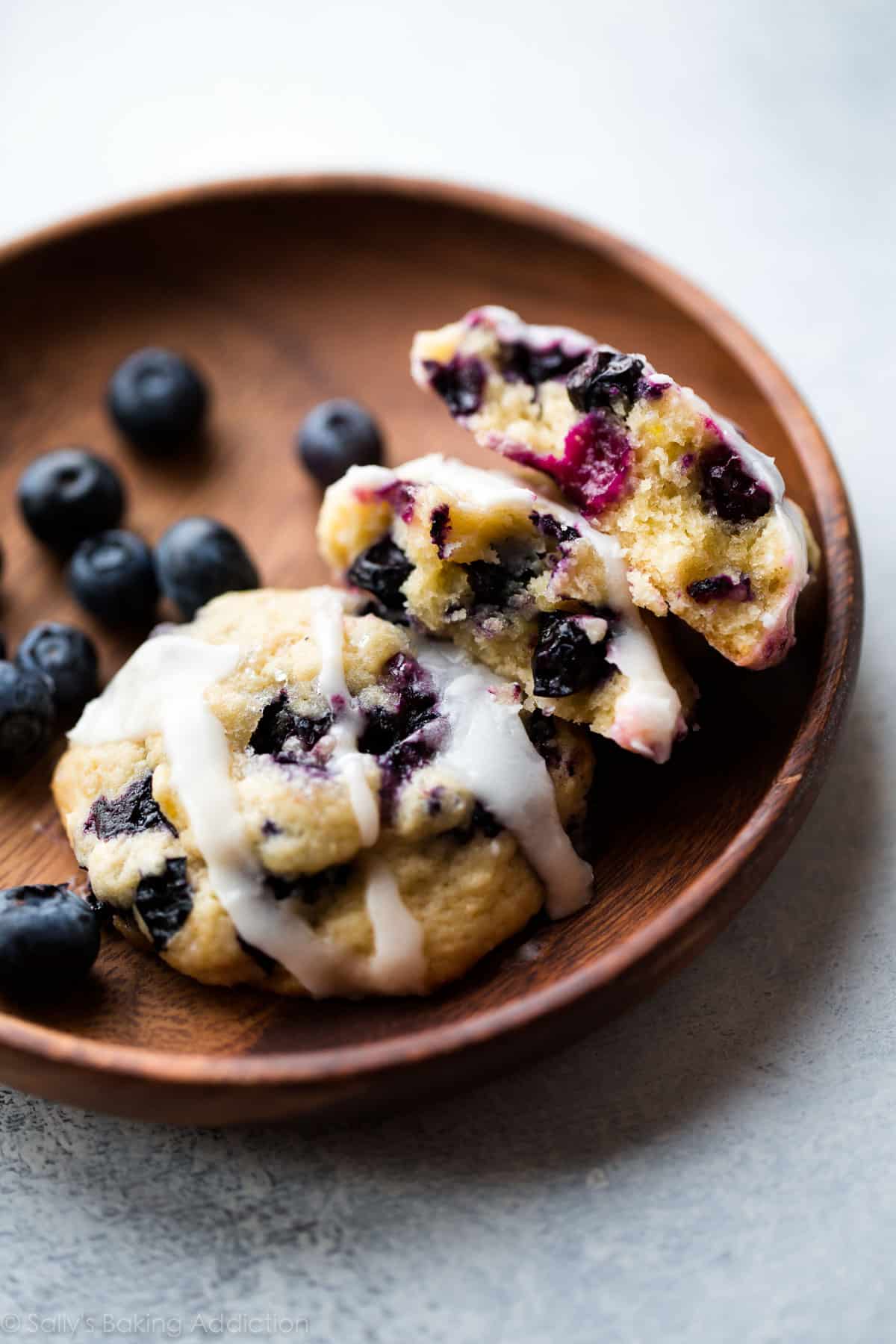 Blueberry muffin cookies on a wood plate