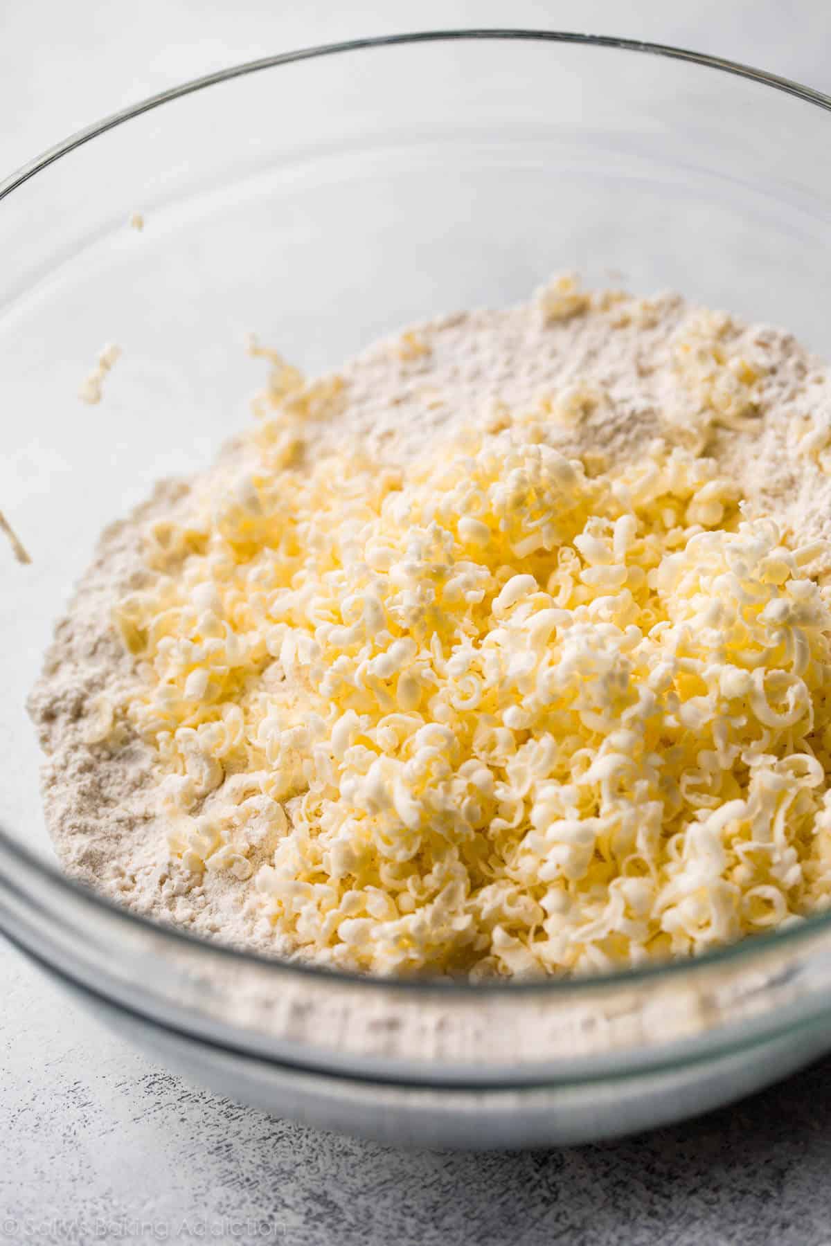 grated butter in a glass bowl