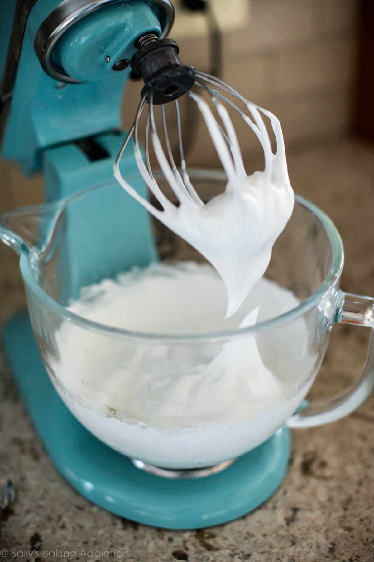meringue topping for lemon meringue pie in a glass stand mixer bowl