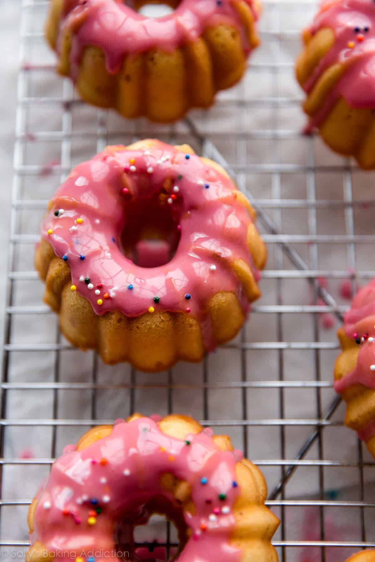 Mini pound cakes with raspberry icing and sprinkles