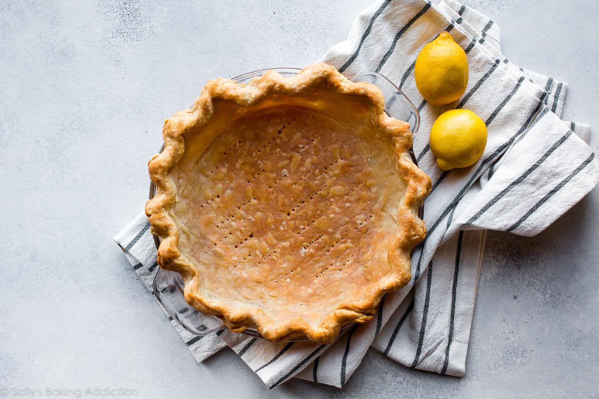 blind baked pie crust in a glass pie dish