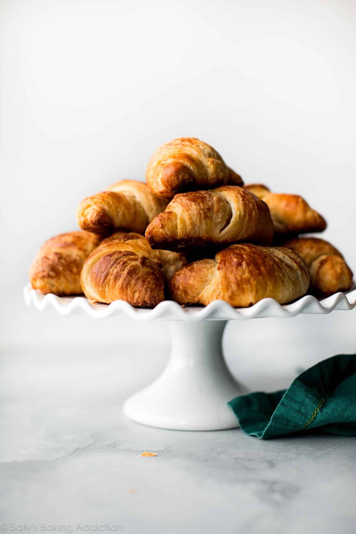 croissants on a white cake stand