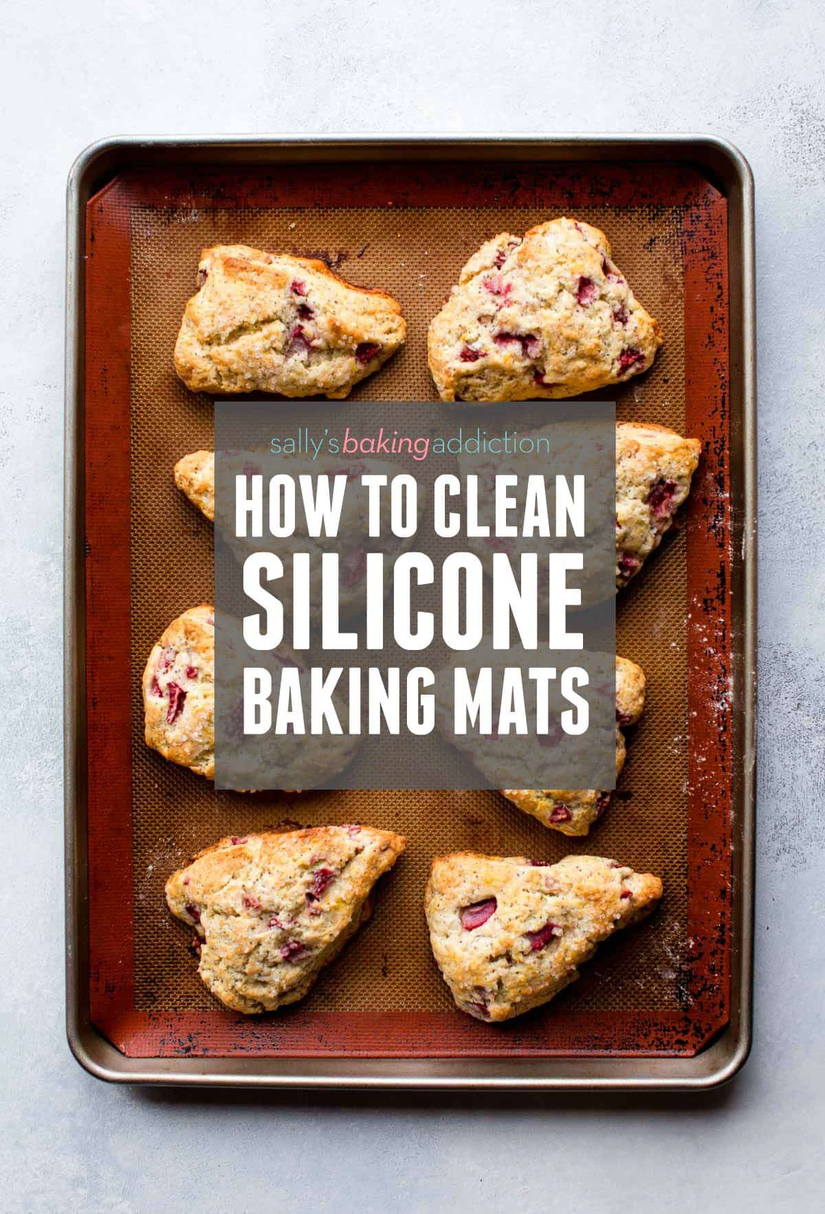 scones on a silpat lined baking sheet with text overlay for how to clean silicone baking mats