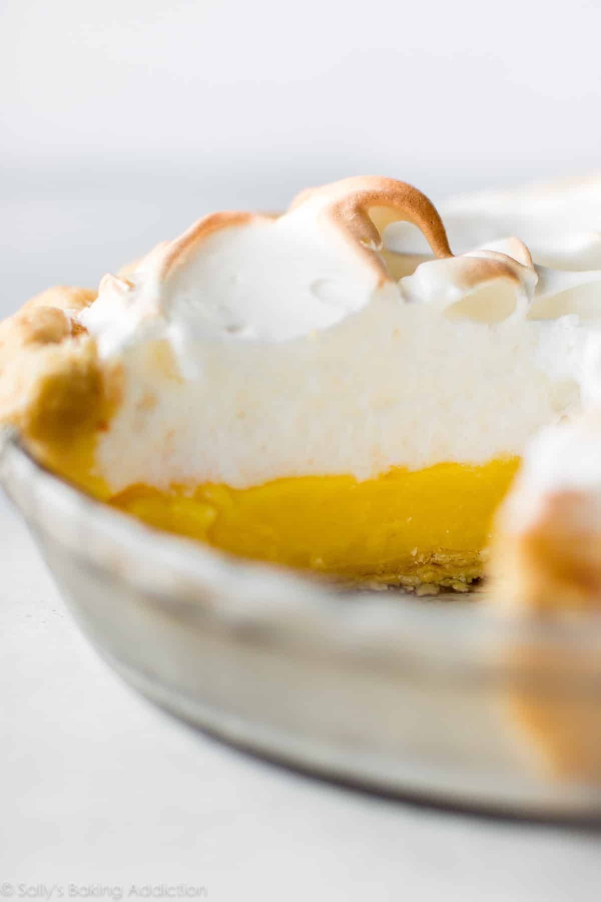 Lemon meringue pie in a glass pie dish