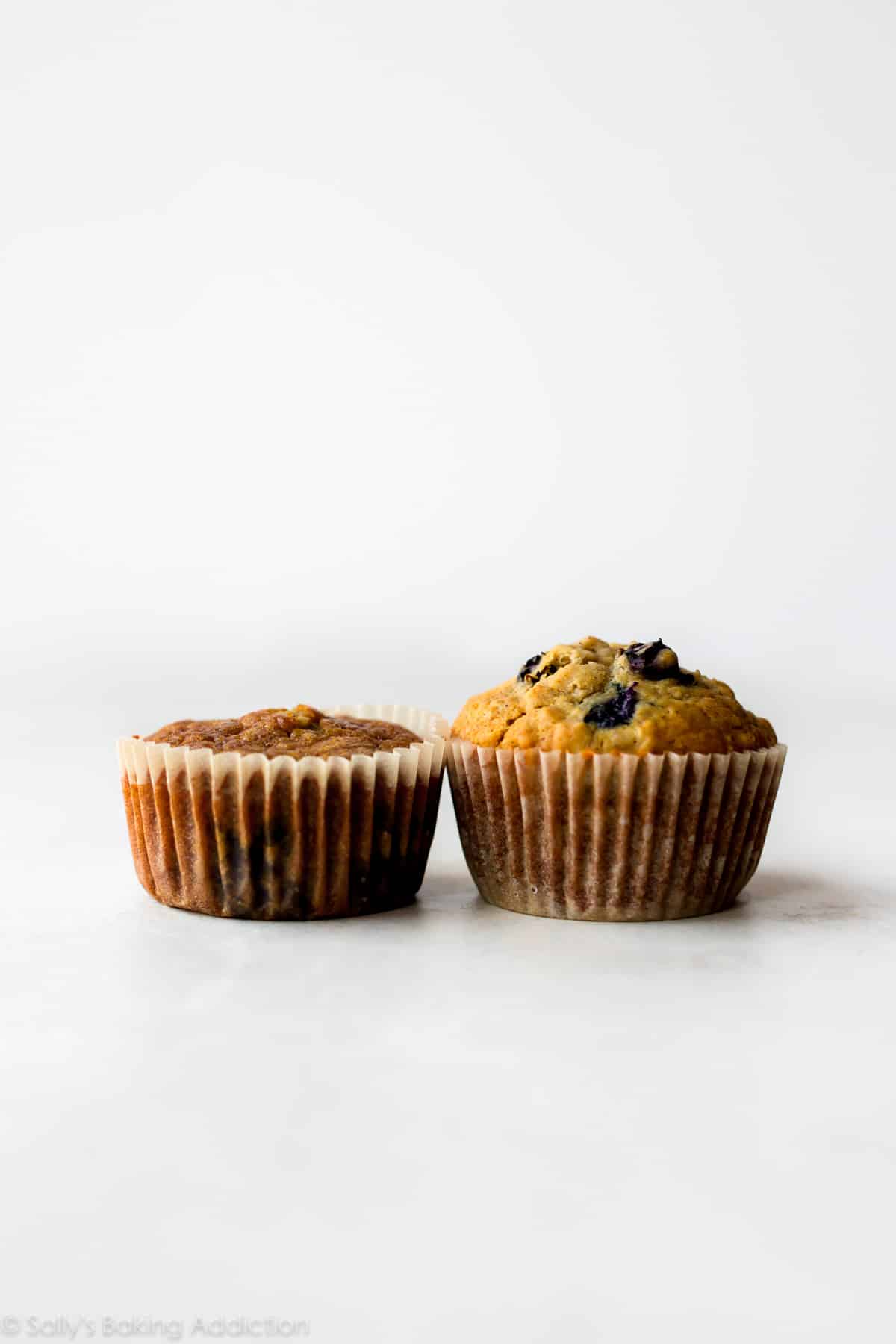 2 muffins including one flat muffin and one regular muffin