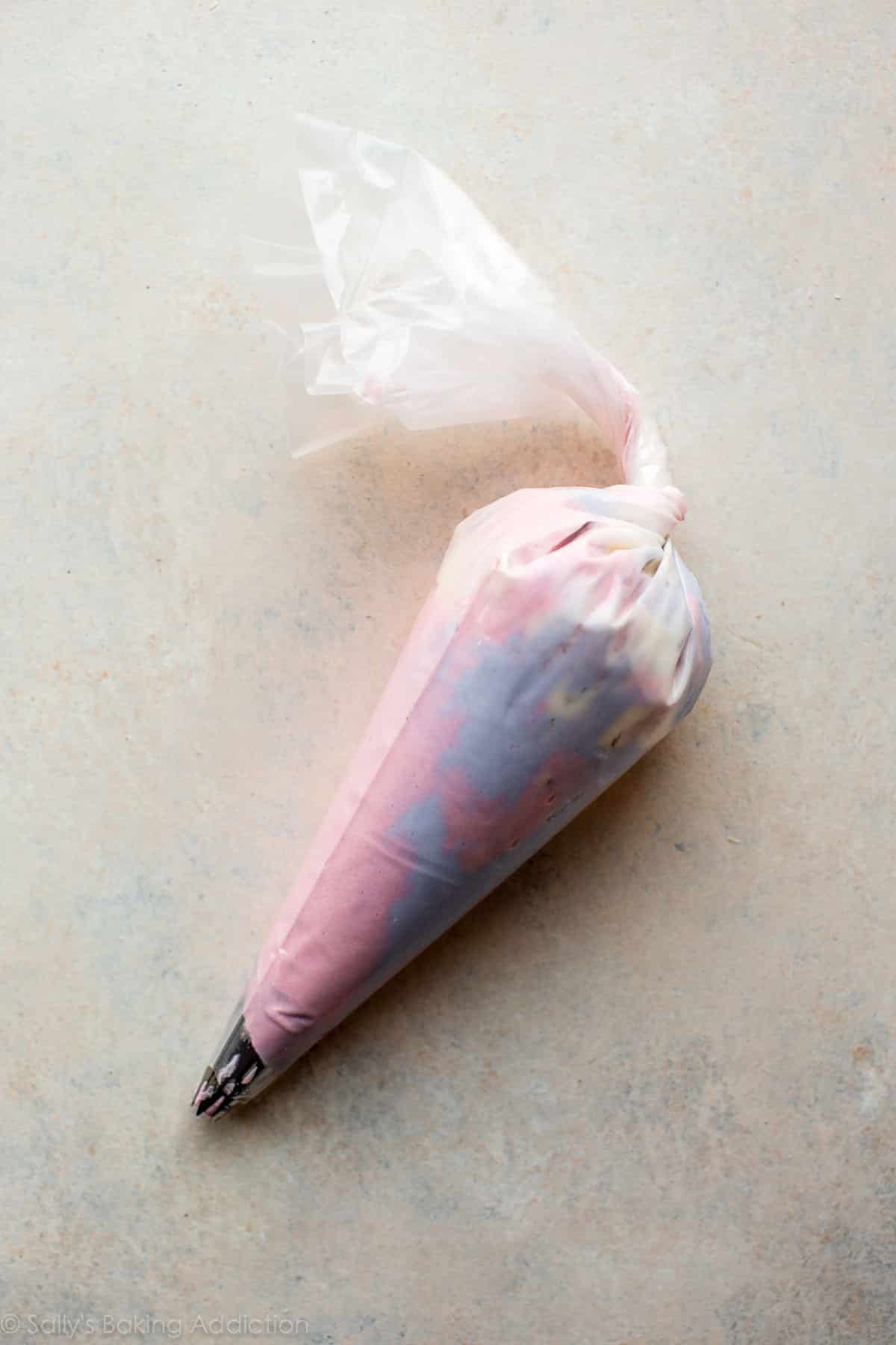 piping bag with pastel frosting