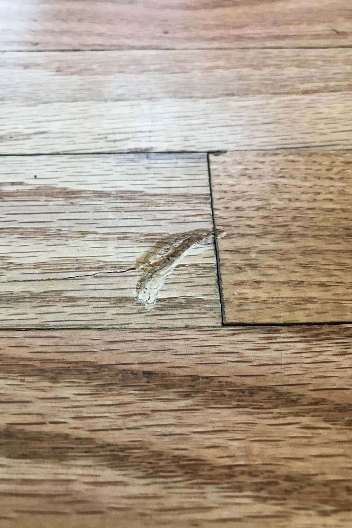 dent from stand mixer on kitchen floor