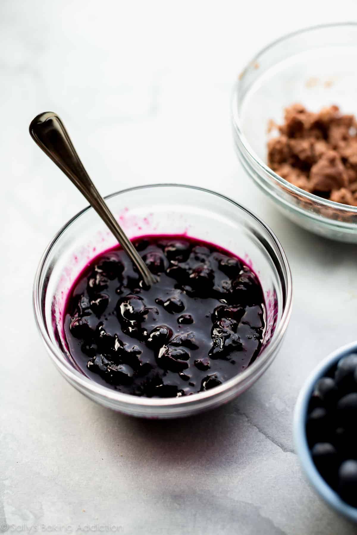 homemade blueberry sauce topping in a glass bowl