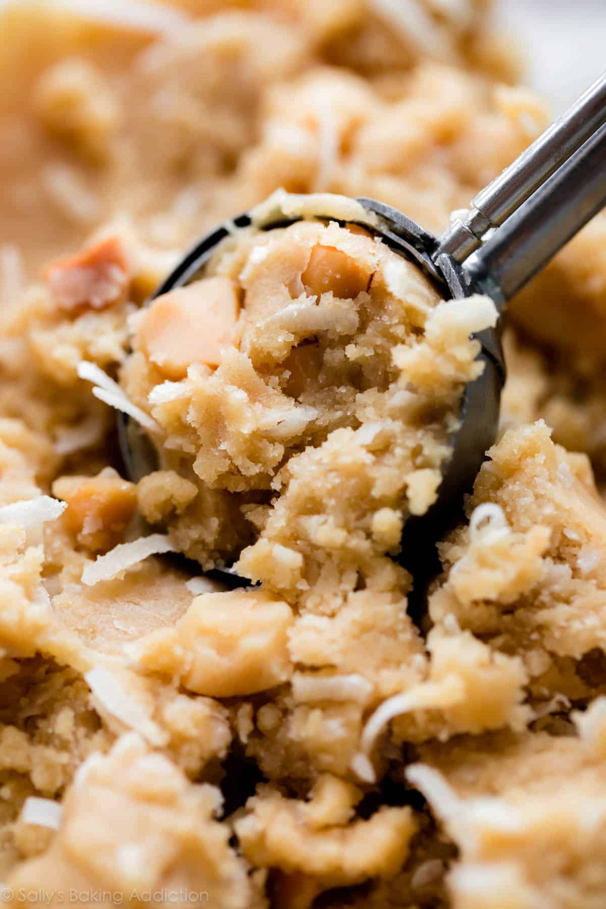 Coconut macadamia nut cookie dough with a cookie scoop