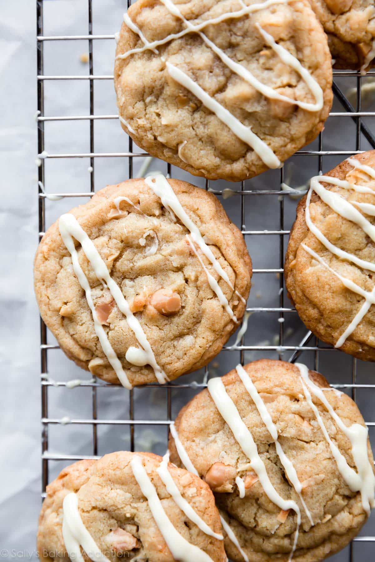 coconut macadamia nut cookies with white chocolate drizzle