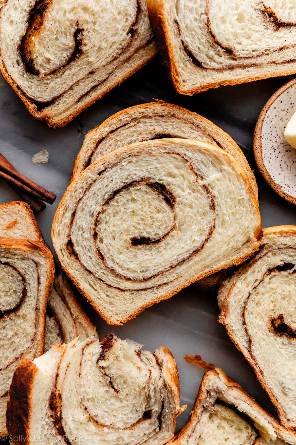 overhead photo of homemade cinnamon swirl bread slices.