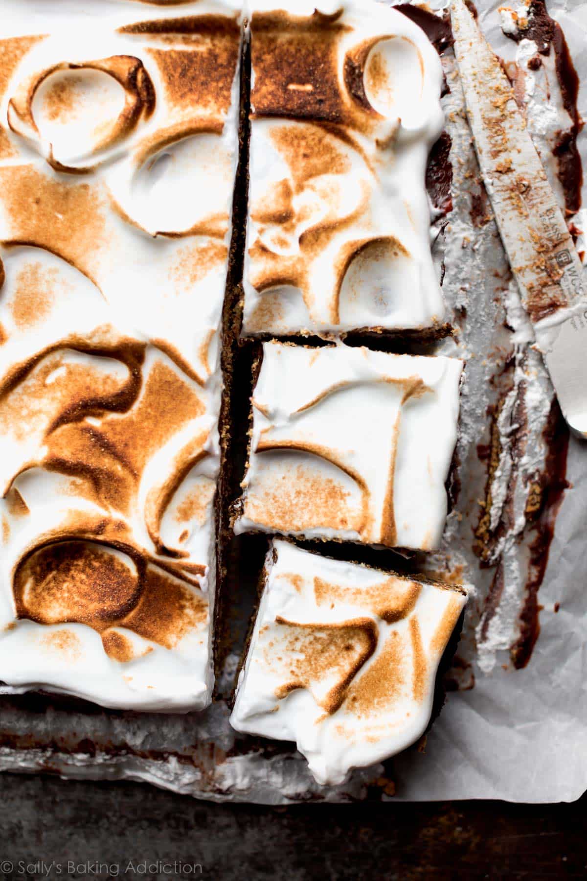 overhead image of no bake s'mores cake with toasted marshmallow meringue topping