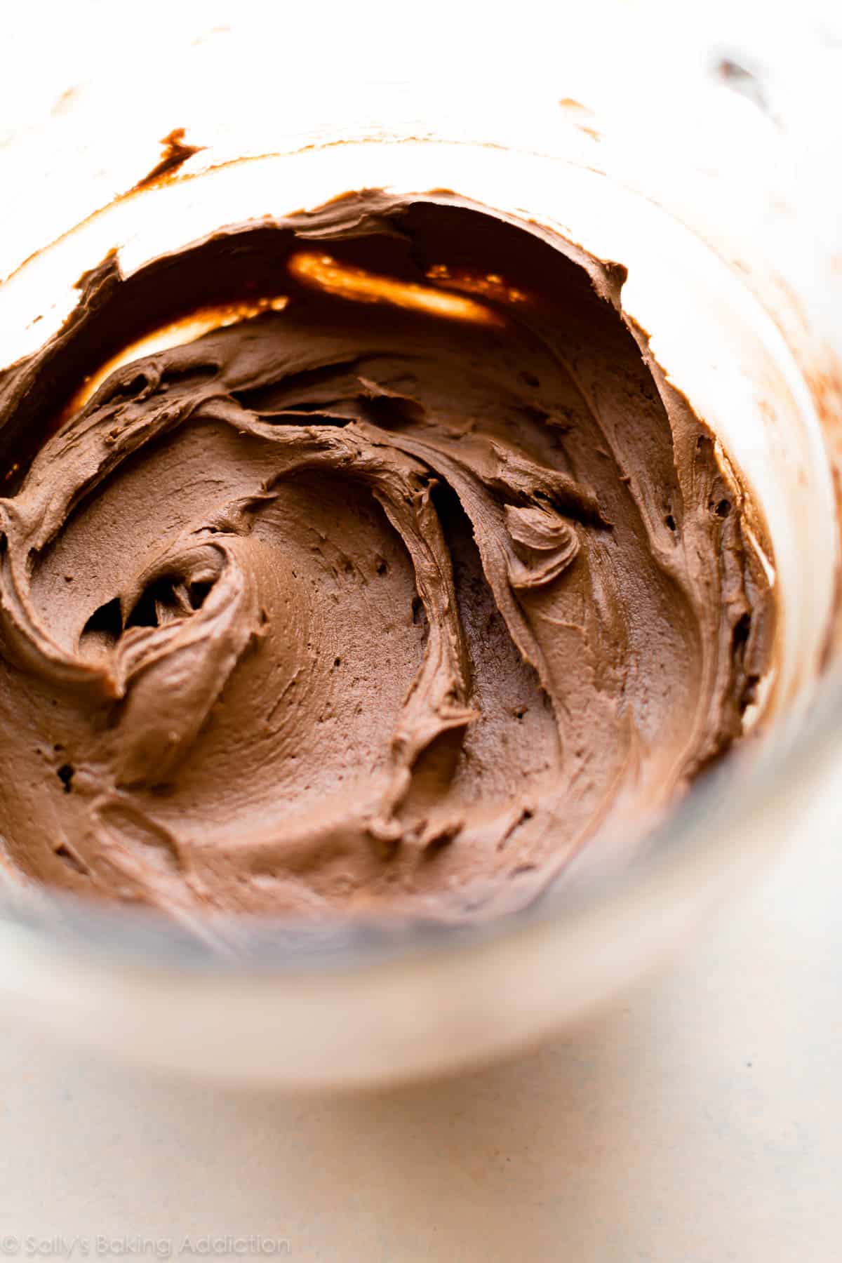 chocolate peanut butter frosting in a glass bowl