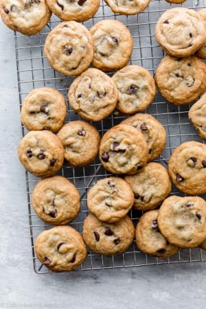 crispy chocolate chip cookies on a cooling rack