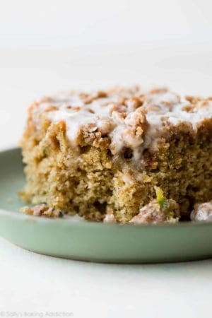 piece of zucchini crumb cake on a green plate