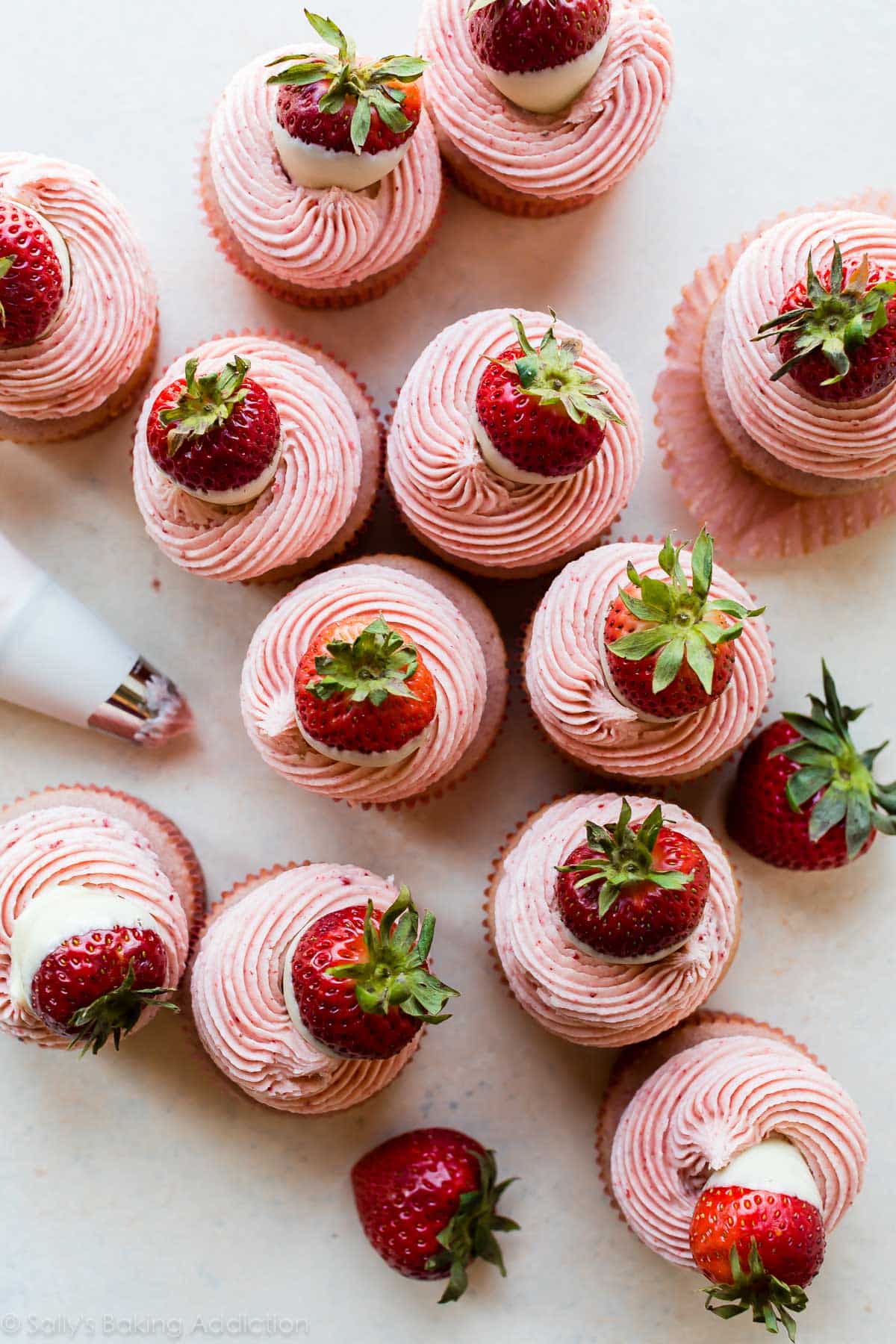 overhead image of white chocolate strawberry cupcakes