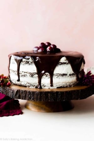 Black Forest Cake on a wood slice cake stand