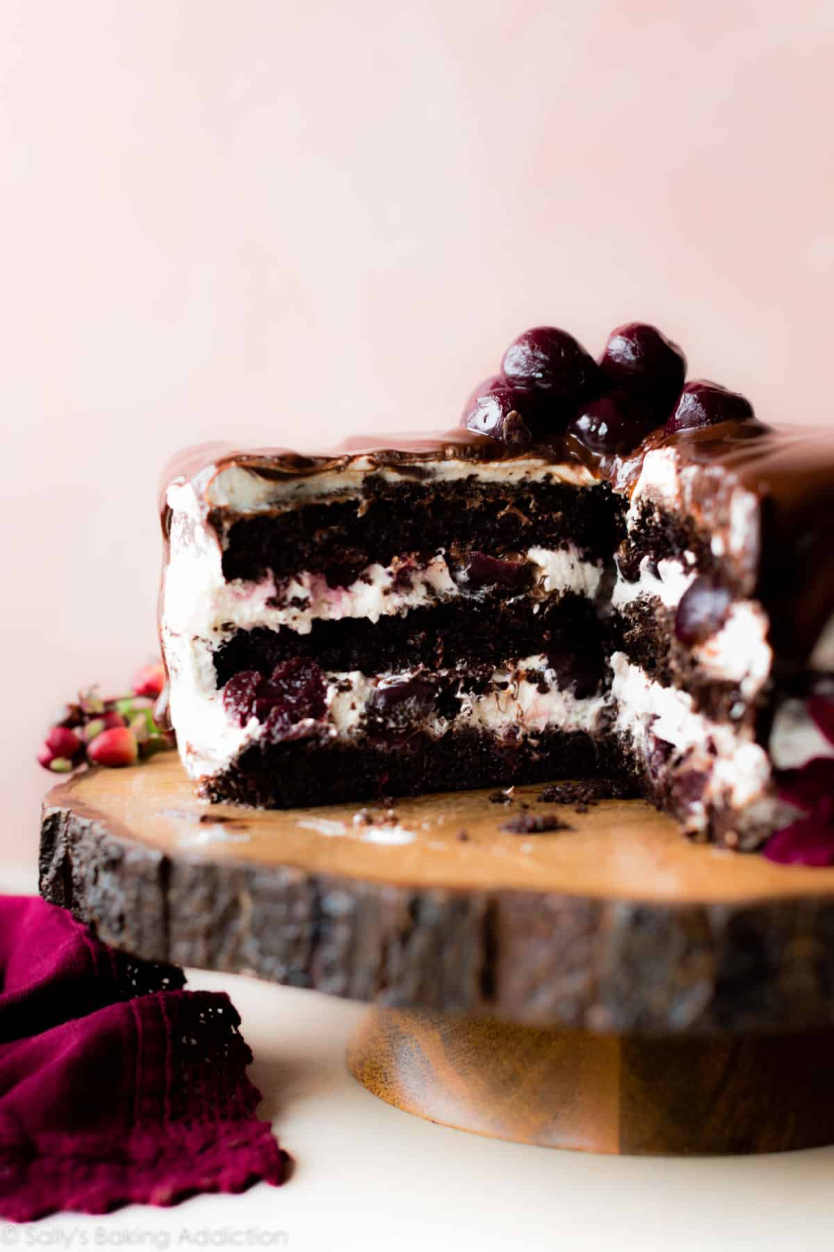 Super-moist chocolate cake, whipped cream, and dark sweet cherries are Black Forest Cake! Homemade chocolate cake on sallysbakingaddiction.com