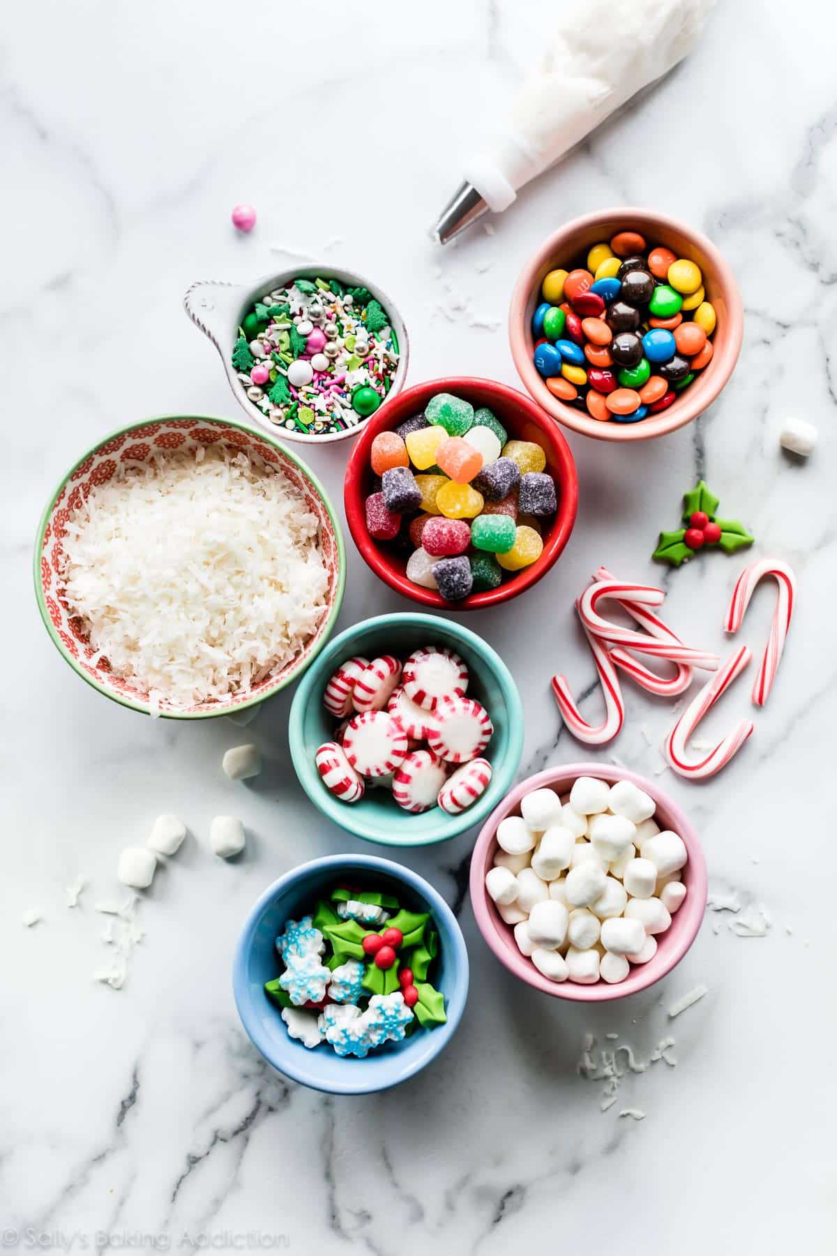 Colorful candy in bowls for decorating gingerbread house