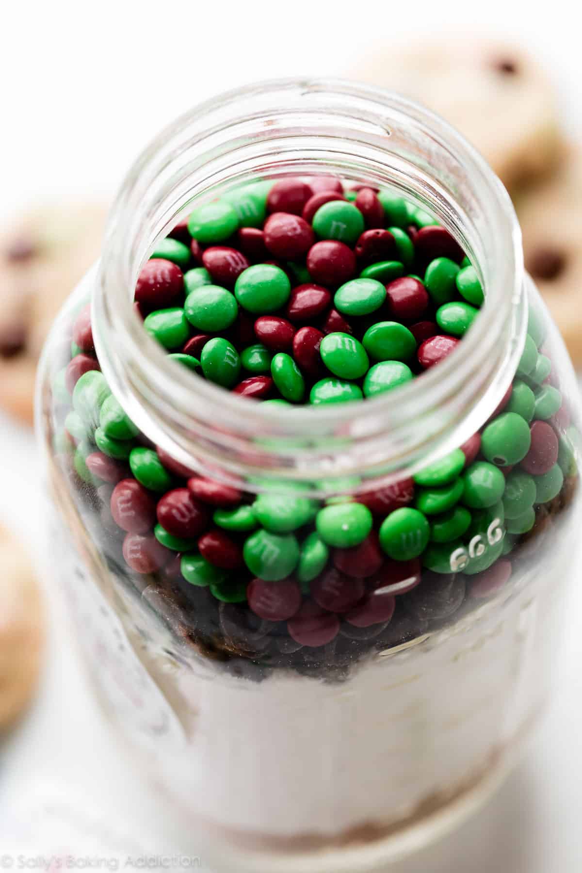 Red and green Christmas M&Ms in a jar cookie kit