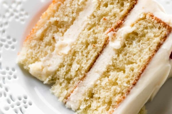 Vanilla cake slice on white plate