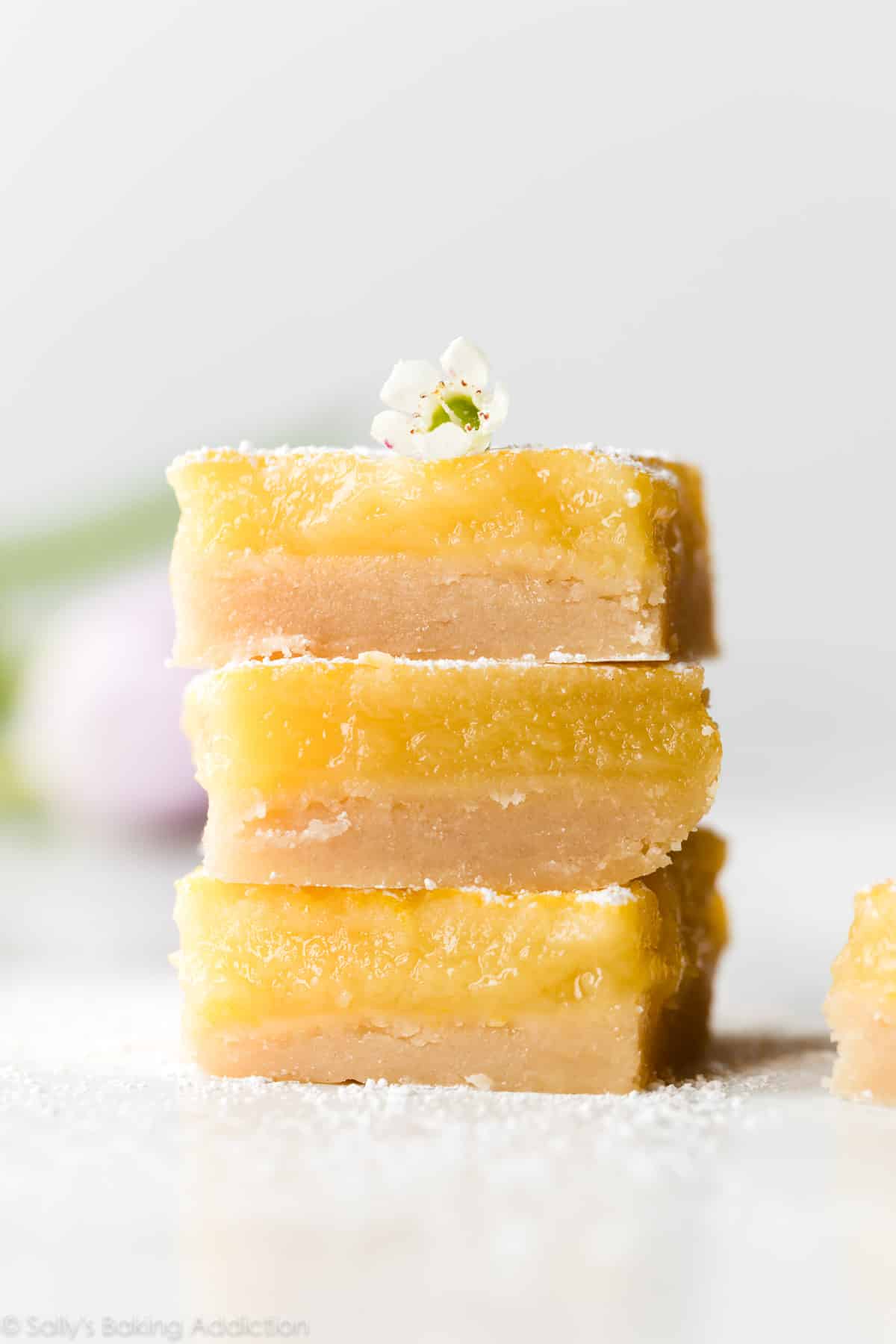 stack of lemon bars with shortbread crust